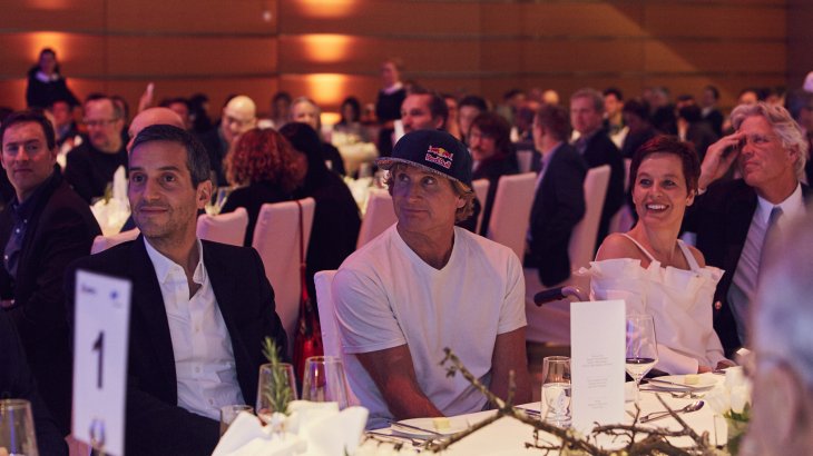 Surf star Robby Naish (middle) at the VIP table.